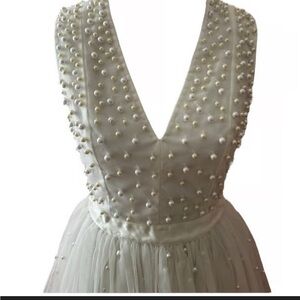 Pearl-Studded Ivory Wedding Gown